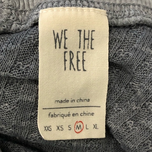 Free people with a free, gray, sheer oversized top - Picture 11 of 12